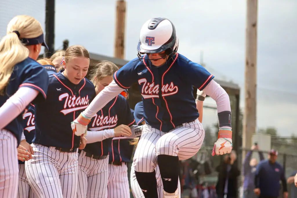 Prep softball: Titans roll to pair of victories, return to district title game