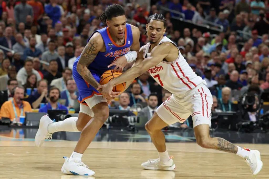 Houston's Milos Uzan withdraws from 2025 NBA Draft