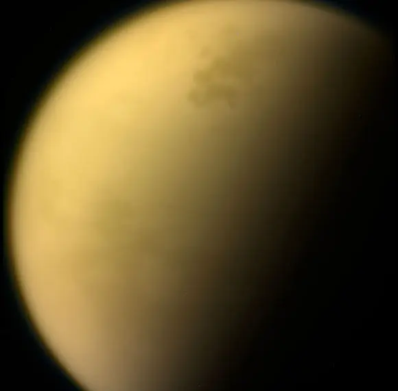 Atmosphere of Saturn’s Hazy Moon Titan Wobbles Like Gyroscope, Planetary Researchers Find