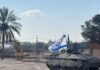 Israeli Troops Fight Through Rafah, Seize Border Crossing, Key Road