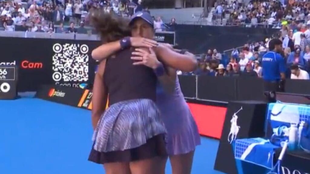 Naomi Osaka consoled after being forced to retire hurt with abdominal injury against Belinda Bencic