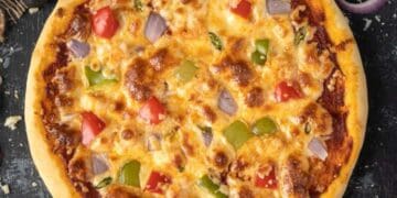 Onion Peppy Pizza With Spicy Arugula.