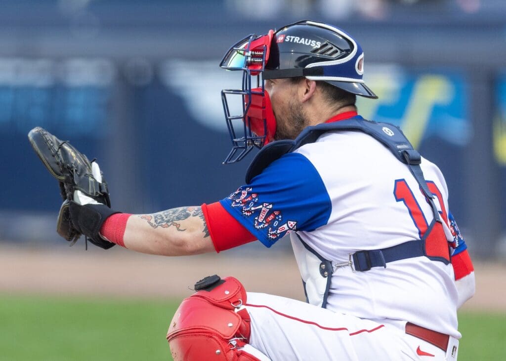Veteran catcher Yasmani Grandal opts to stay with WooSox, hopes to learn from Jason Varitek