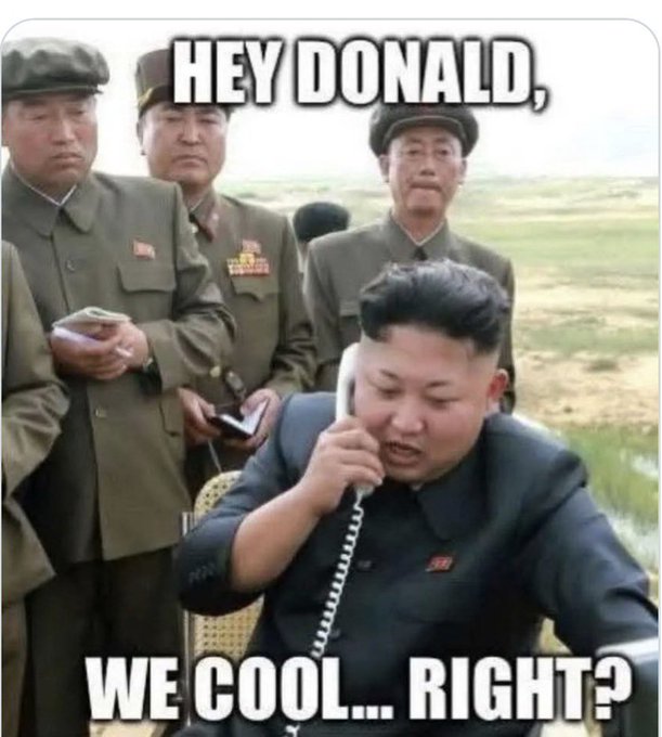 Man in a dark suit on a corded phone, with soldiers in brown uniforms in the background; meme caption says 'Hey Donald, we cool... right?'